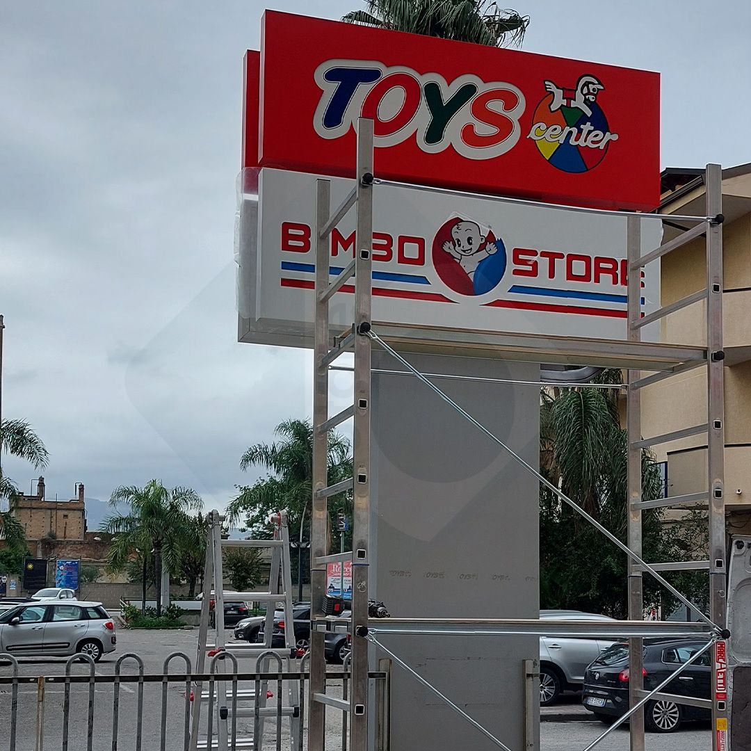 TOYS CENTER BIMBO STORE Totem retroilluminato in Dibond a LED